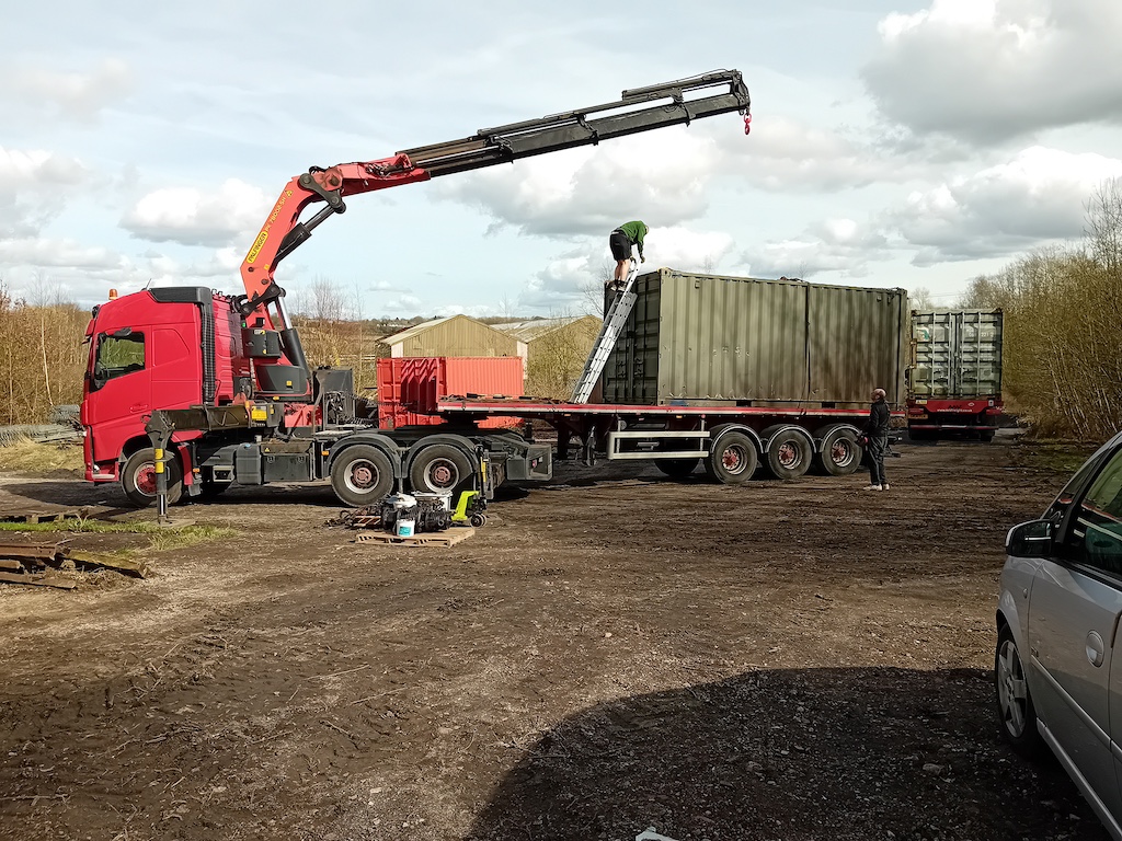 Container being moved